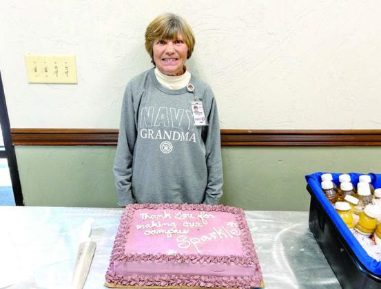 Seminole State College hosted a retirement breakfast for Gloria Wheeler on Nov. 29 at the E.T. Dunlap Student Union. Wheeler, a resident of Earlsboro, has worked at SSC for 21 years as a custodian. Pictured: Wheeler stands by her cake, which reads, “Thank you for making our campus sparkle.” Photo provided