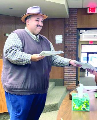 Oklahoma Film &amp; Music Office Outreach and Production Manager, Yousef Kazemi passed out packets to the Tecumseh City Council explaining the Oklahoma Film and Music Incentive Program. Julie Talton, Countywide &amp; Sun
