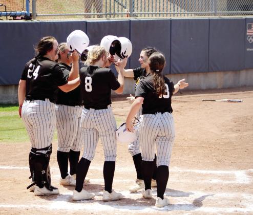 Tecumseh’s Vivian Hayes celebrates at home plate with her teammates after hitting a home run in the third inning of the Class 5A Slow Pitch State Quarterfinals on May 2. The Lady Savages won that game with Cache, 15-5, and lost in the Semifinals to North Rock Creek, 13-18. They end their season with a record of 28-9, and a rank of #3. NRC went on to win in the finals. Countywide &amp; Sun/Natasha Dunagan