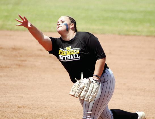 Tecumseh’s Kylei Daniels lobs the ball over home plate in state quarterfinal action.