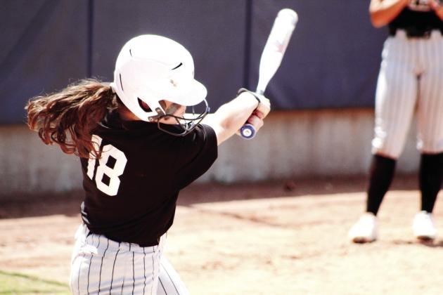 Tecumseh’s Katie Overstreet hits a single in the fourth inning of the Class 5A Slow Pitch State Quarterfinals.