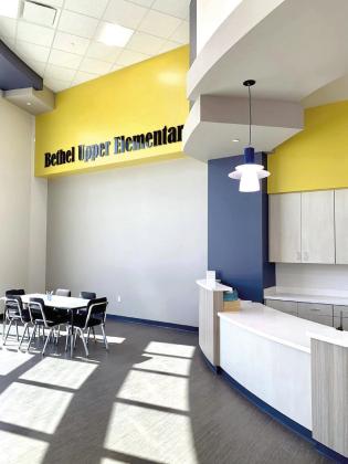 The entry to the new Bethel Upper Elementary is bright, cheery, and filled with natural sunlight, welcoming staff, students, and parents. Photos provided.