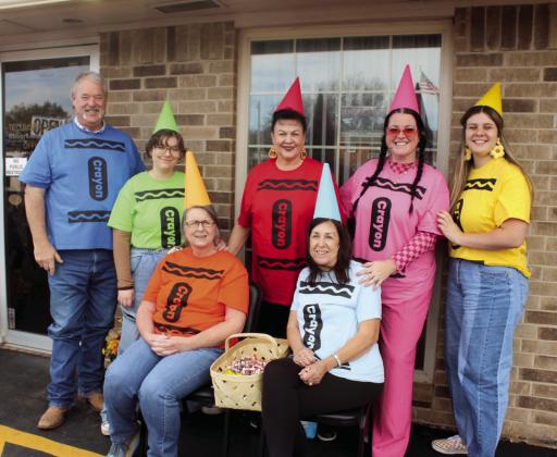 Everyone at Gilbert's Insurance and Tecumseh Tag Agency dressed as Crayola Crayons during the Tecumseh Business Treat 'r Treat on Oct. 31. Shown, from left, front row, are Angie Mabry, Leda Canada, back row, Randy Gilbert, Halle Curley, Suzanne Gilbert, Annie Jo Gilbert and McKenzi Henson.