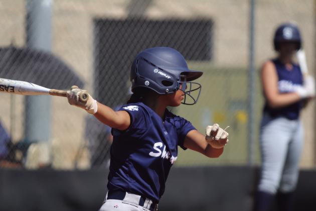 Shawnee’s Zoey Betchel makes contact while at bat.