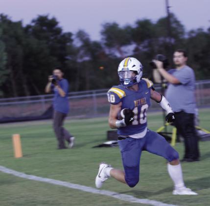 Bethel junior Luke Quinter runs into the end zone for a touchdown.