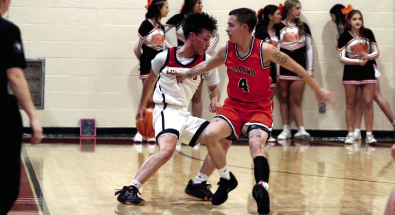 Earlsboro's Isac Nice guards the ball and looks to pass during the Jan. 6 home Pink Out game against Konawa. Natasha Dunagan, Countywide &amp; Sun