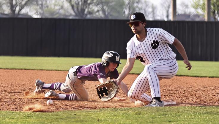 North Rock Creek's Alexander Monge gets the throw from Braden Ueltzen. Photo courtesy of Gowin Photography