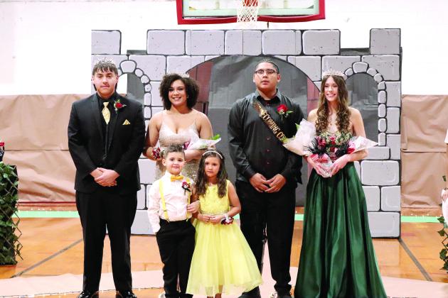 Earlsboro High School held their Winter Homecoming ceremonies before the basketball game against Strother on Dec. 16. Seniors Rodney Stryker and Eve Barkus were crowned King and Queen, and sophomores Quintin Lena and Natalie Peters were chosen as Prince and Princess. The crown bearer was Harper Nielsen, and the flower girl was Easton Elmore. Photo provided by April McGehee.