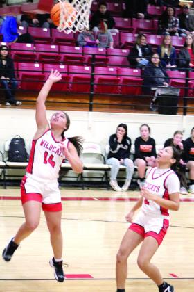 Earlsboro’s Sierra Streater steals the ball and makes two points .