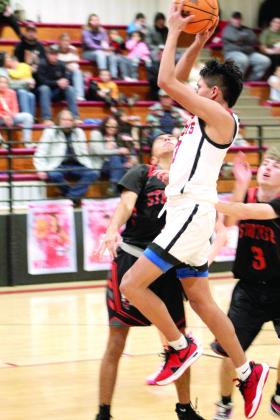 Earlsboro’s Wes Lowe tries for two points during the second half of their Homecoming game.