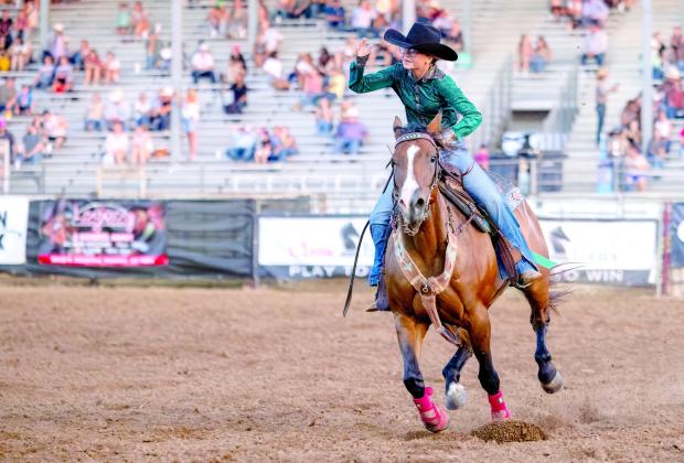 Kinzlee Jones, of Shawnee, checks her time at the end of her barrel race on the evening of July 11 at the International Finals Youth Rodeo. Photo courtesy of Richelle Treece.