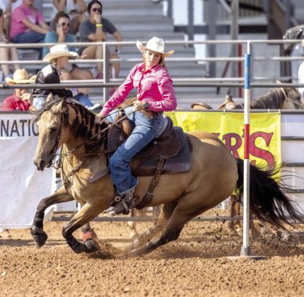 Cassidy Wilson, of Shawnee, rounds the end of the poles on the morning of July 10 at the International Finals Youth Rodeo. Photo courtesy of Richelle Treece.