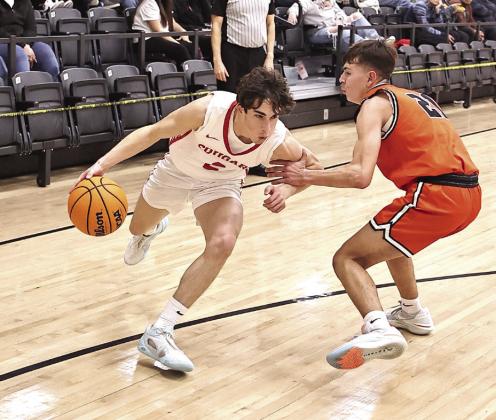 North Rock Creek’s David King drives to the basket.