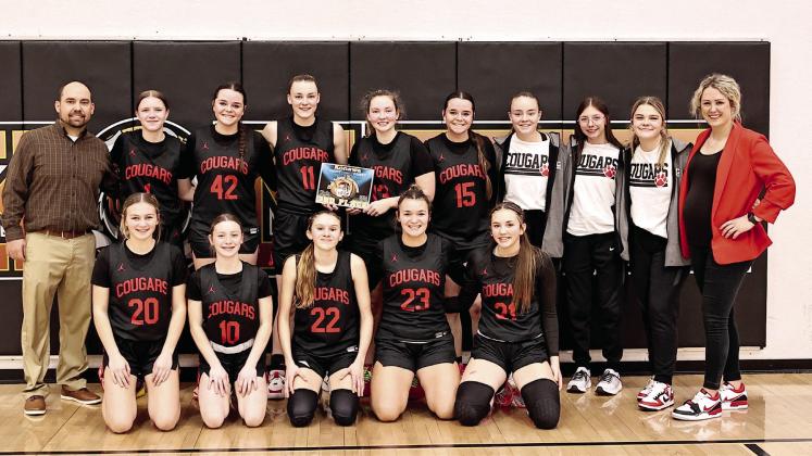 North Rock Creek’s Lady Cougars pose for a photo after capturing the third place trophy. Photo courtesy of Gowin Photography