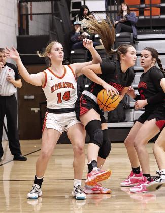 North Rock Creek’s Daci Nemecek grabs a rebound.