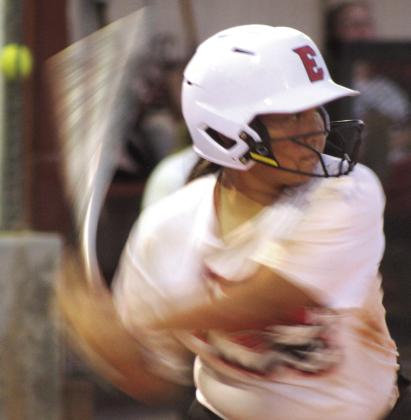 Earlsboro sophomore Izzy Lindsey takes a swing at bat during the Aug. 24 game at McLoud.