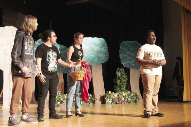 In the role of the Lion, Tecumseh seventh-grader Connor Hill sings “If I Were King of the Jungle,” as Tinman (Brody Johnston), Scarecrow (Jay Ahlstrom) and Dorothy (Calyn Harris) ask him questions during “The Wizard of Oz” play practice on April 11. The Wizard of Oz will be presented at the W.P. Wood Alumni Buillding on April 26 and 27. Countywide &amp;amp; Sun/Natasha Dunagan