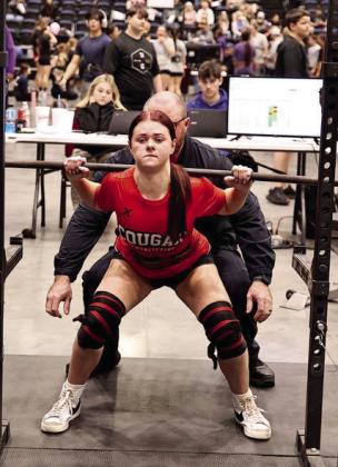 Elektra Coughran won the 132 pound class. She squatted 260 pounds (pictured) and deadlifted 265 pounds, placing first in both. Photo Provided by Gowin Photography