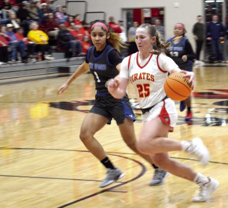 Dale senior Teague Muncy drives toward the paint during the Jan. 17 homecoming game with Millwood. The Lady Pirates won, 66-37. Countywide &amp; Sun/Jessica Jones