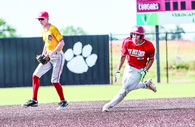NRC's Kona Paningsoro rounds 2nd on a hard hit to left field.