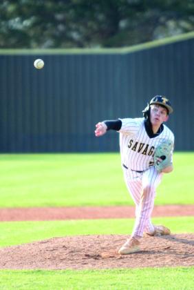 Tecumseh senior Lane Steward puts a spin on the ball during the March 25 home game with Blanchard. The Savages fell, 0-11. Natasha Dunagan, Countywide &amp; Sun