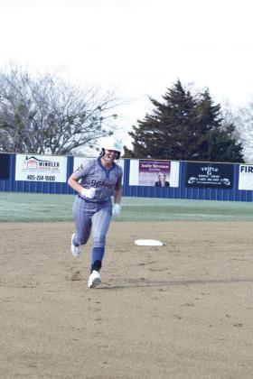 Payton Epperly makes her way around the bases after hitting a grand slam against Harding Charter on March 12. The Lady Wildcats walked away with a run rule 15-1 and then offered up some players to their opponet for the JV game that followed. Countywide &amp;amp; Sun /Julie Talton
