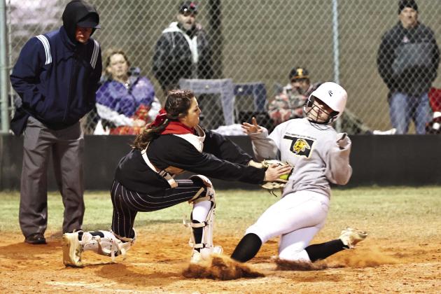 North Rock Creeks Amari Seidl makes the out at home to stop the tying run from happening. NRC came from behind to beat the Tecumseh Lady Savages 9-8. The Lady Cougars are 5-0 for the season. Photo courtesy of Gowin Photography