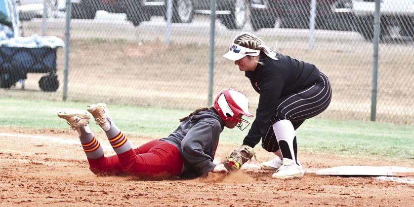 North Rock Creeks Hannah Earlywine makes the tag putting the Dale player out. NRC won 15-4. Photo courtesy of Gowin Photography