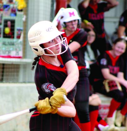 McLoud senior Alivia Scott prepares for a hit. Natasha Dunagan, Countywide &amp;amp; Sun