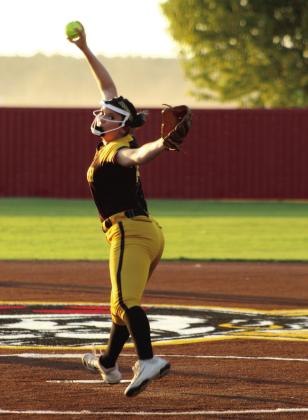 Tecumseh senior Jacee Townsend aims for home as she winds up and catches air during the Aug. 18 game at Dale. Photos by Natasha Dunagan, Countywide &amp;amp; Sun