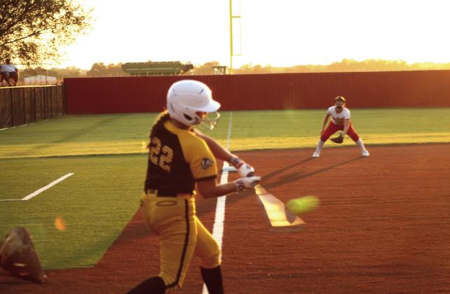Tecumseh freshman Paisley Farris makes contact at bat during the fourth inning of the Aug. 18 game at Dale.