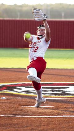 Dale sophomore Salem Flatt balances on one toe as she launches her fast pitch during the Aug. 18 home game against Tecumseh. The Lady Pirates won 10-0, and are 9-0 for the season, so far. Dale also held a ribbon-cutting for their newly-turfed softball field that day.