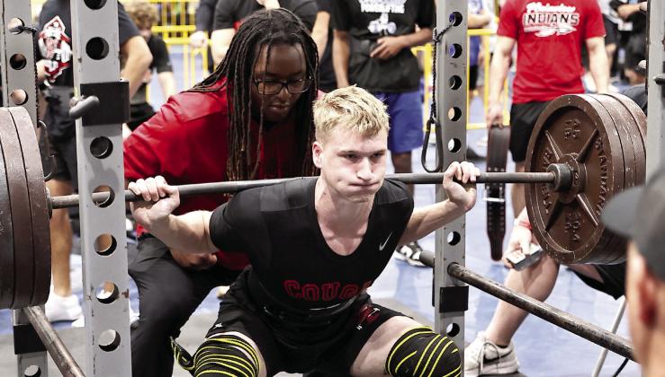 North Rock Creek's Kaiden Samuels squats 450 pounds. Samuels placed third in the 157 pound weight class. Photo courtesy of Gowin Photography