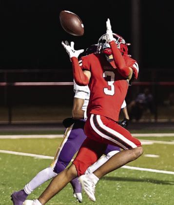 NRC's Tyson Hawkins makes a great catch for a first down. The Cougars lost to Anadarko to close out the season. Photo Courtesy of Gowin Photography