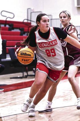 North Rock Creek’s Robyn Click drives the baseline.