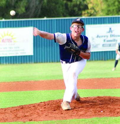 Asher sophomore Blake Francis puts a twist on his pitch during the second inning.