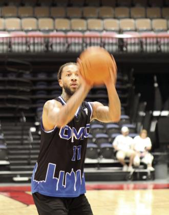 Tavares Sledge, on the OMC team, shoots a foul shot during the game against the Gotdatwurk team in the FireLake Arena Fall Shootout Basketball Tournament on Oct. 15. OMC won their first game, 59-62, in the double elimination Pro-Am tournament. They went on to win second in the tournament. Countywide &amp;amp; Sun/Natasha Dunagan
