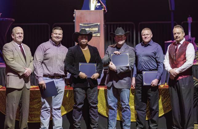 Shawnee Police Foundation Chairman Ken Stafford (far left) and Shawnee Police Chief Mason Wilson (far right) present Letter of Commendation With Risk to Sgt. Heath Streater, Cpl. Casey Vague, Cpl. Austin Bizzell, Cpl. Jonathan Tate, and Cpl. Jake Duggan (not necessarily in order). Photo by Workingman Photo.