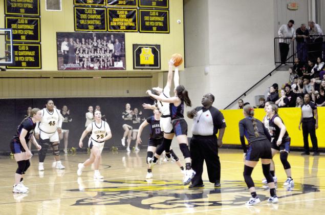 Cadence Leba tips off the senior night game against Harrah on Feb. 14, 2025. Countywide &amp; Sun/Jessica Jones