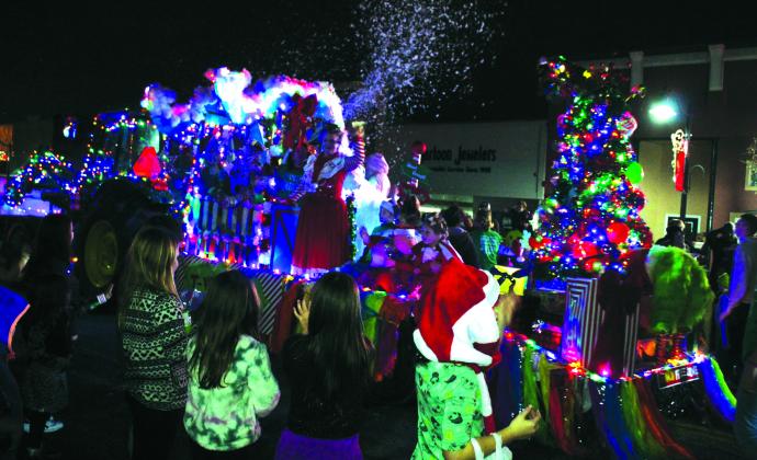 The Tecumseh 4H-FFA Booster Club float was pulled by a tractor and produced snow from its roof for the Grinchmas Holiday Parade and Marching Band Contest in Tecumseh on Dec. 8. They won first place. Countywide &amp;amp; Sun/Natasha Dunagan