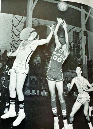 Coach Bill Grogan's 1967-68 Tecumseh High School yearbook features a picture of him at tip-off with the Earlsboro Wildcats. At a height of 6' 7', Grogan grew up on the family farm near Tecumseh and loved the competition of basketball. His role model was Coach Bob Avery, his high school coach. The following year, Grogan's team made it to the state tournament. Photo provided.