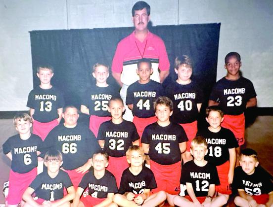 Coach Bill Grogan poses with the Macomb Elementary School third- and fourth-grade basketball team. Years later, in 2005, Grogan would take them to the state tournament. Photo provided