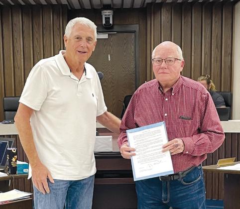 Mayor Ed Bolt presenting former Commissioner of Ward Six Ben Salter with a Resolution of Appreciation in honor of his service from January 17, 2017 to September 6, 2022. Bolt said, “Ben Salter has demonstrated to be a person of upright character, a good citizen, a friend to many and a worthy representative of the City of Shawnee.” Countywide &amp;amp; Sun/Loren Knight