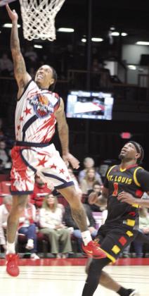 Potawatomi Fire Guard Chuck Guy steals the ball and takes it to the hoop. According to potawatomifire.com, Guy made 34 points and broke his own team record by making 22 out of 26 free throws. Natasha Dunagan, Countywide &amp; Sun