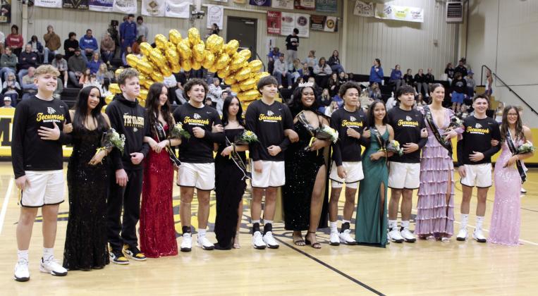 Queen Kiara Stallin, center, poses with her court during the Tecumseh High School Spring Homecoming on Feb. 7. Countywide &amp; Sun/Natasha Dunagan