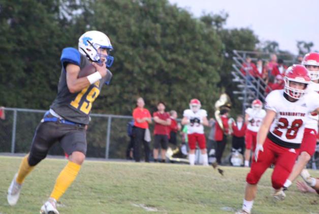 Bethel senior John Gordon carries the ball during the Homecoming Game against Washington on Oct. 1. After four straight wins, Bethel lost 18-56. Countywide &amp;amp; Sun/Natasha Dunagan