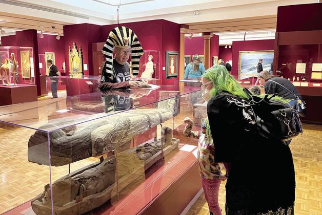 Visitors of the Mabee-Gerrer Museum of Art’s ‘Mummy Day’ learn about Tutu. The 2023 ‘Mummy Day’ will be held Nov. 4. The Museum will offer free admission all day for visitors to explore the galleries and exhibits and enjoy mummy-themed art activitie. Photo provided