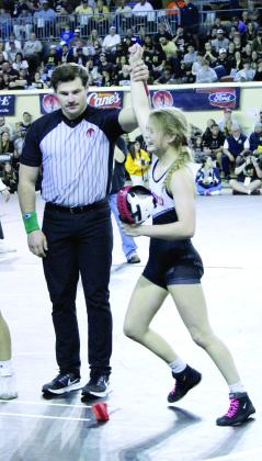 McLoud freshman Carli Sisco won her match to become the first state champion girl wrestler at MHS on March 1 at the State Fair Arena. Photo provided by Coach William Winters.