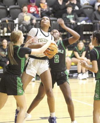 Tecumseh’s Janya Bruner draws a foul as she goes to the basket during the Jan. 28 home game with Seminole. The Lady Savages won, 69-27. Countywide &amp;amp; Sun/Natasha Dunagan