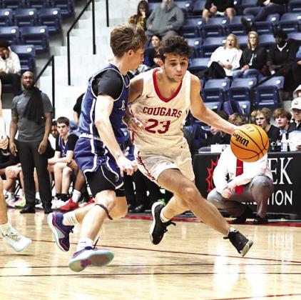 NRCs Devon Haney, left, gets pressure from the Newcastle defender.